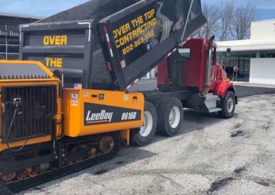 Over the Top truck and paving equipment